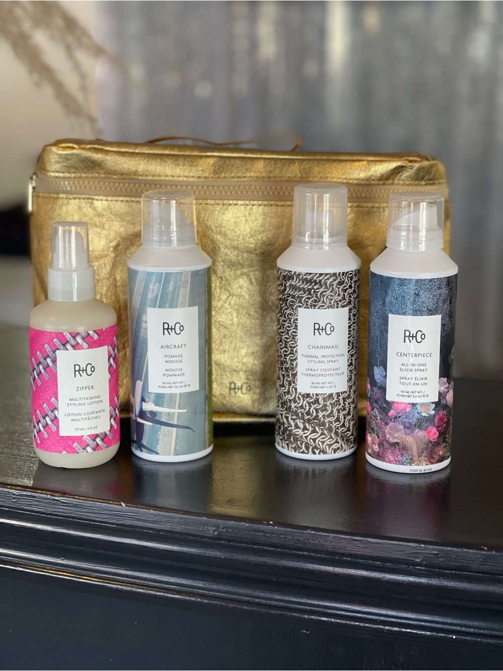 R+Co Travel Styling Set with Gold Cosmetic Bag.